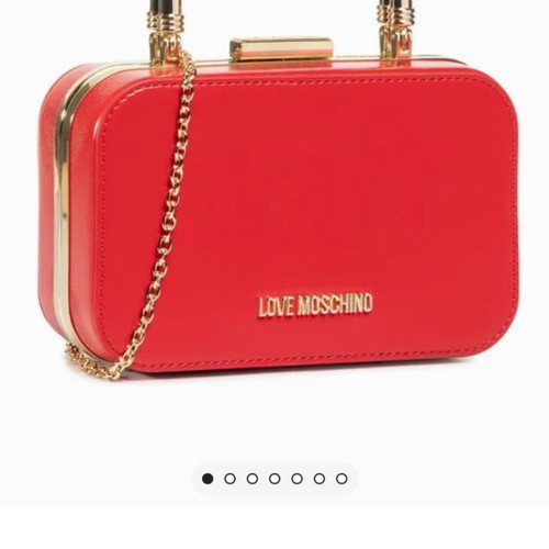Love Moschino red shoulder bag like new with gold metal clasp and embossed detail