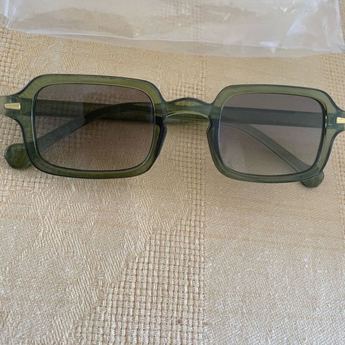 Sunglasses new in green color
