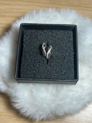 Infinity hoop earrings like new, silver color