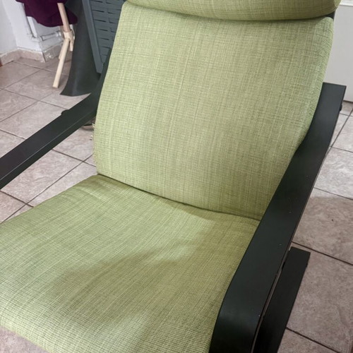 IKEA rocking armchair used, black frame and green cushions