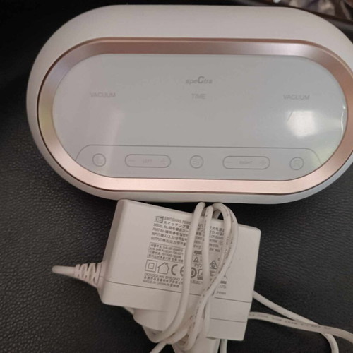 Spectra electric breast pump used with charger and tubes