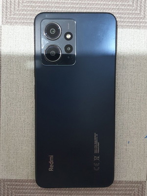 Redmi Note 12 smartphone 128GB, 4+4GB RAM, cracked screen
