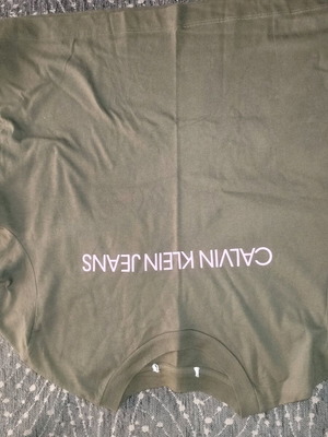 Calvin Klein khaki blouse with pink letters, like new, long sleeve, size large