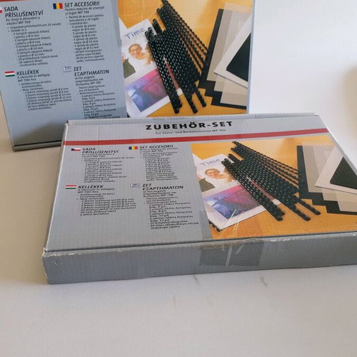MP700 Binding Machine like new with spiral binding materials