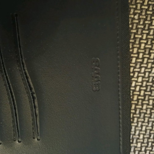 Saab car document holder used with service book