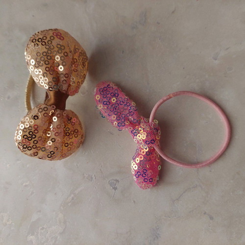 Children's hair ties with bow designs like new, set of two