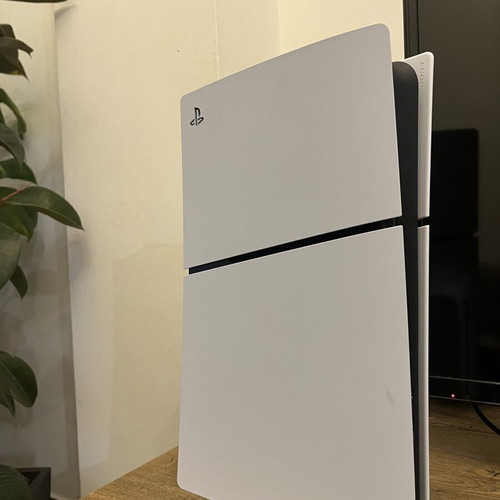 PlayStation 5 slim 1TB with disc drive and 2 DualSense controllers