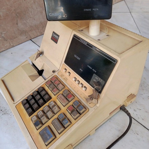 Vintage cash register used for decor without drawer