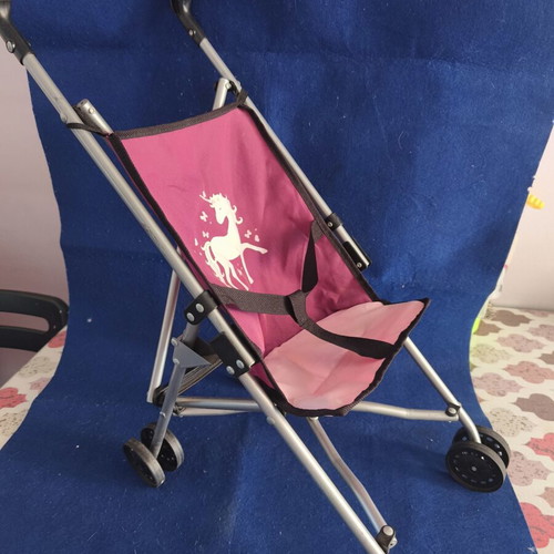 Toy stroller like new, lightweight and foldable