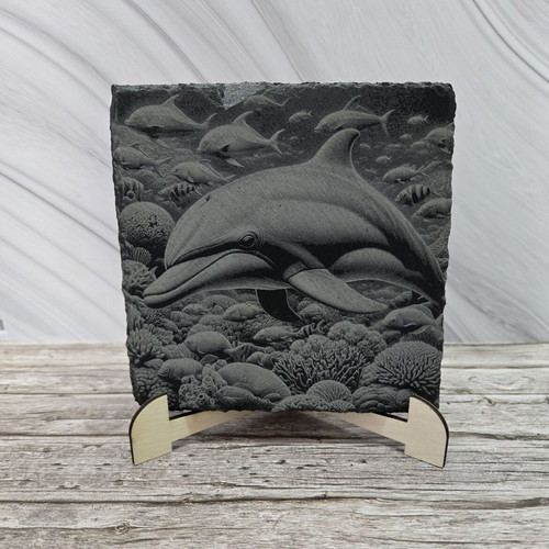 Engraved volcanic tile dolphin new, 13x13 cm