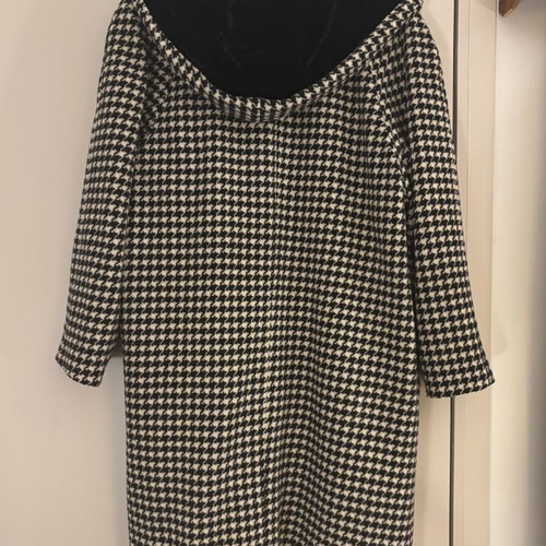 Coat new with velvet lining on hood and buttons, black and white, size XL