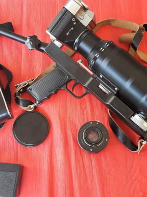 Vintage Zenit EM SLR camera used with accessories