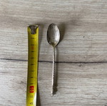 Silver spoon used, approximately 14g