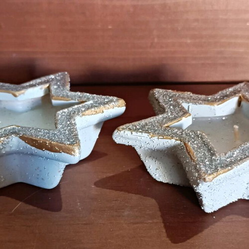 Christmas candles in clay stars with silver glitter new