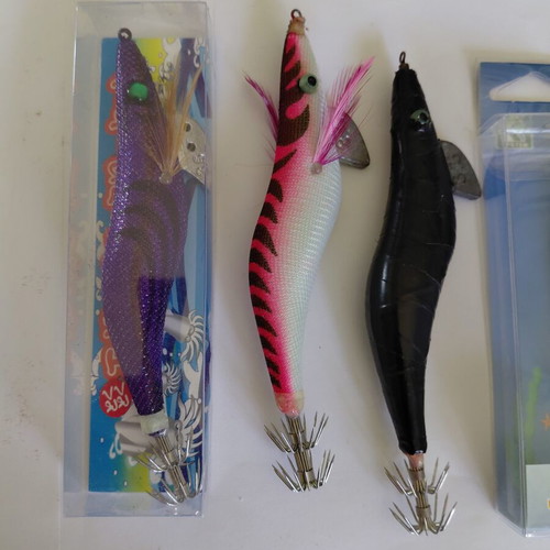 Squid jigs pack of 7 like new, sizes 3.5 to 2.0 with protectors