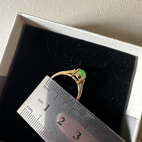 Vintage gold rings set used with pearls and green stone
