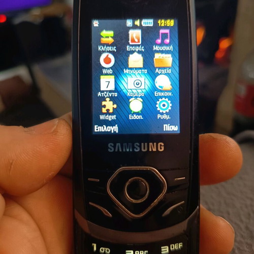 Samsung gt-s3550 cell phone used, black, with good battery