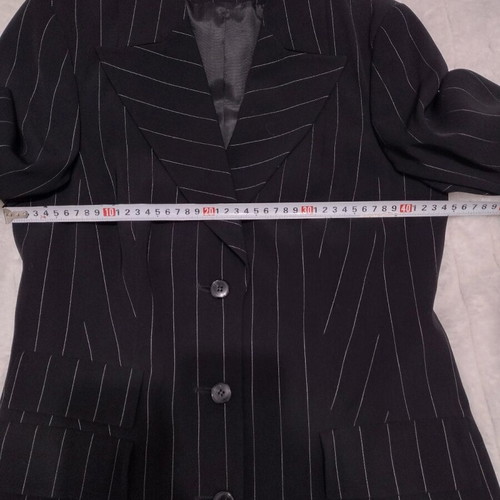 Women's black two-piece suit like new with white pinstripe size M