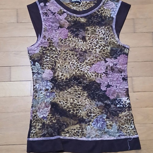 Batic sleeveless floral women's top with mixed animal print, like new, size M