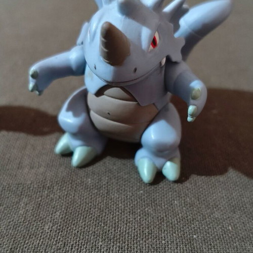 Pokemon Heracross and Rhydon figures like new