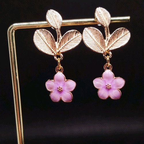 Handmade earrings with purple iridescent flowers