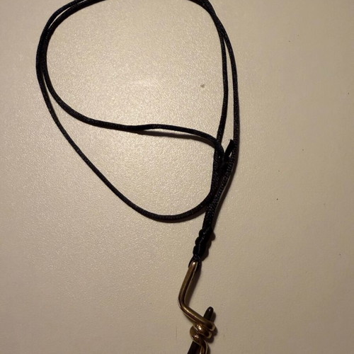 Handmade long steel pendant in gold and black like new