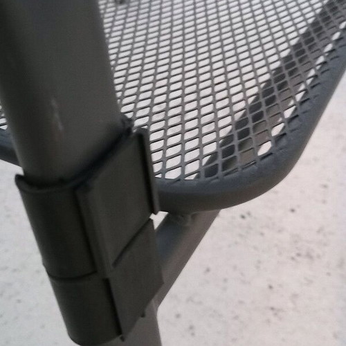 Metal double sofa and glass table used for garden or terrace