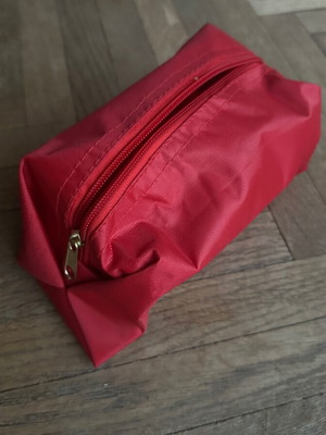 Small red toiletry bag new