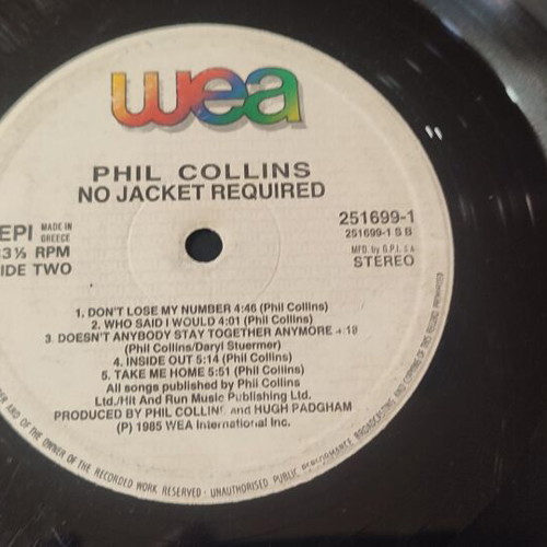 Phil Collins No Jacket Required vinyl record used, scratched, no cover