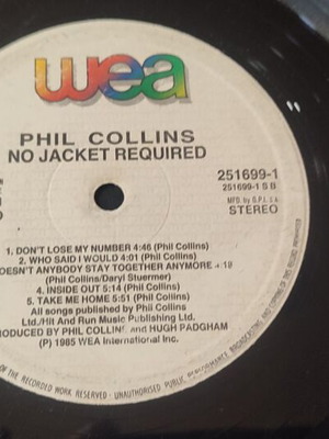 Phil Collins No Jacket Required vinyl record used, scratched, no cover