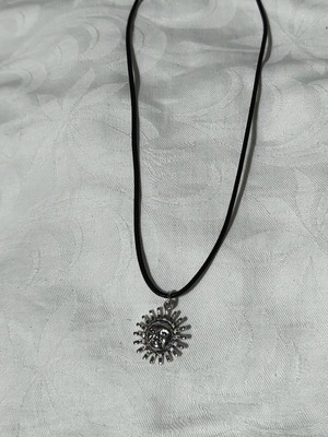 Sun necklace, simple spiritual design, black and silver