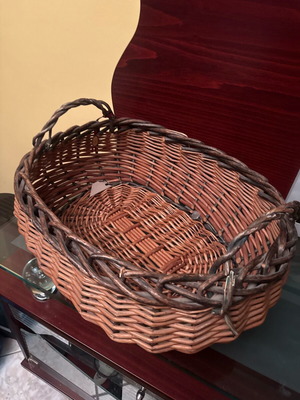 Wicker storage basket used, rustic and practical