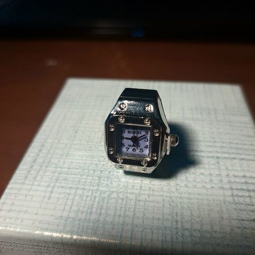 Ring watch quartz with purple dial and silver bracelet like new