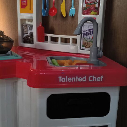 Play Kitchen used, plastic with light, music, and steam