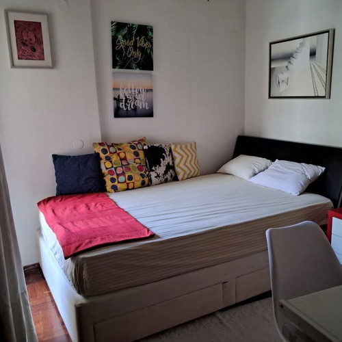 Sturdy bed used with mattress and wooden headboard