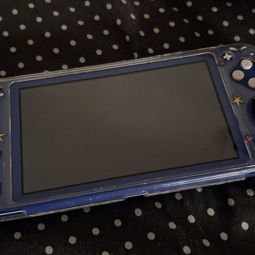 Nintendo Switch Lite like new with gift cases