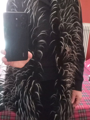 Fur vest long like new, black and white