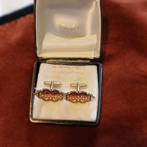 Orofix cufflinks used, vintage, embossed gold on coral background