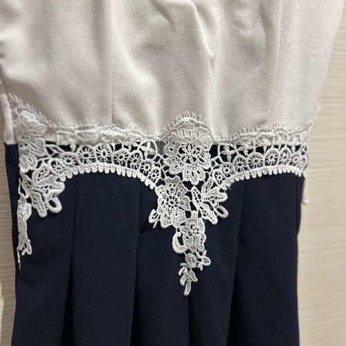 Decoro one-piece white and dark blue with embroidery like new