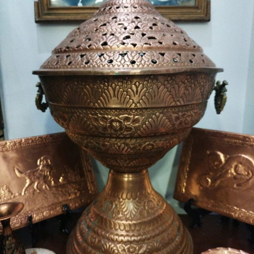 Carved ornate magkali lamp used, folk art