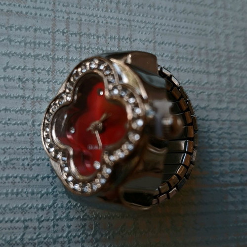 Four-Leaf Clover Ring like new with crystals, quartz watch and red dial