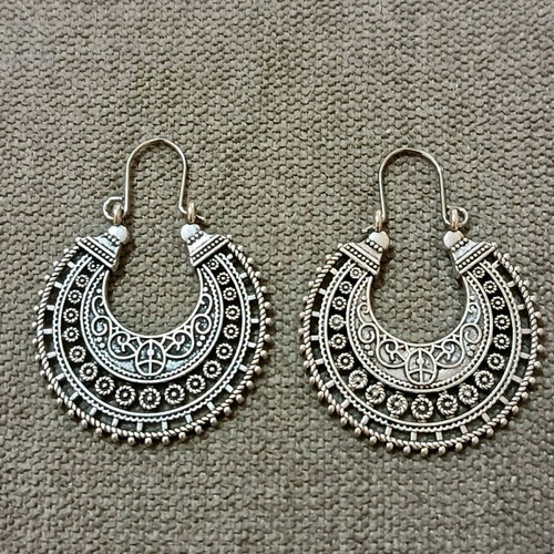 Set of six pairs of earrings new, three dangling and three small