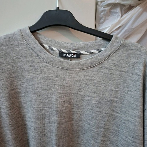 Long-sleeve blouse with ruffle hem gray new