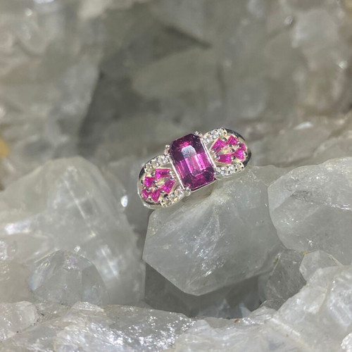 Silver ring with natural rhodolite garnet and moissanite