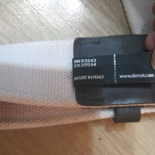 Diesel canvas belt used, white with brass studs and leather details
