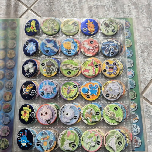 Pokemon collectible caps 213 pieces like new