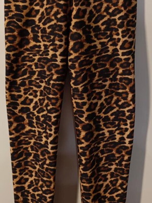 Women's leopard print leggings used, size Medium