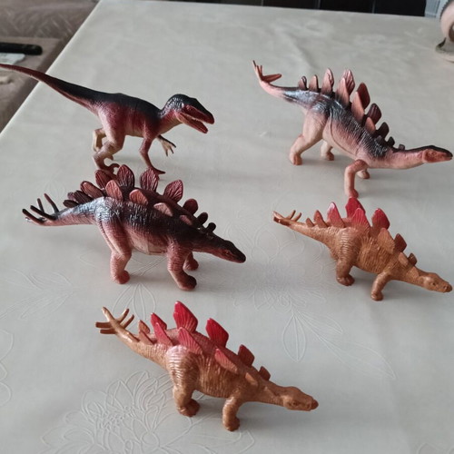 Set of 24 dinosaur figures in various sizes
