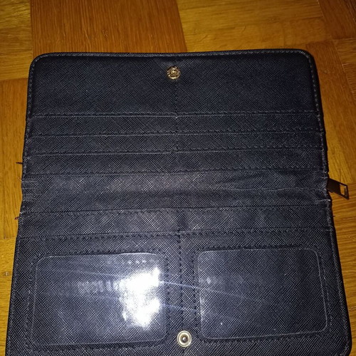 Black wallet slightly used with multiple compartments