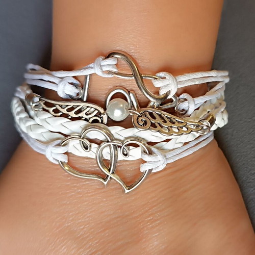 Love bracelet set new with white cords and charms